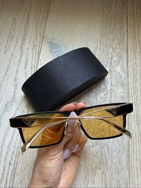 Prada Black Frame Sunglasses with Amber Lenses